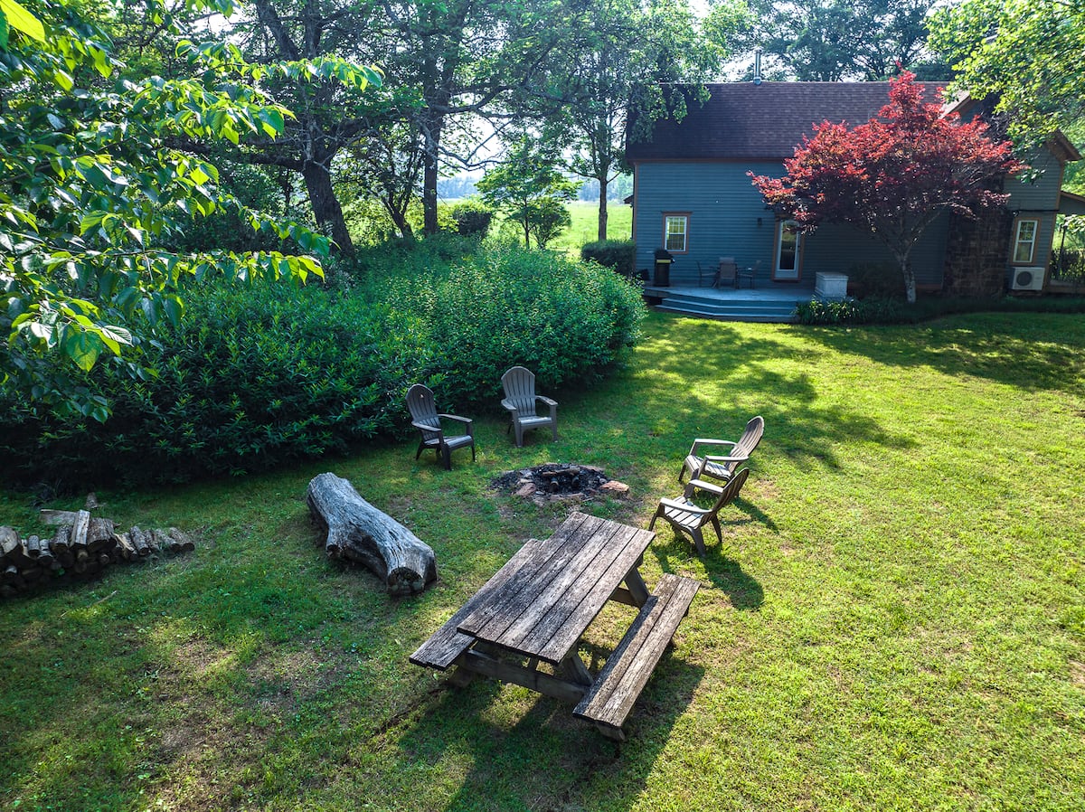 Yard with picnic area and fire pit